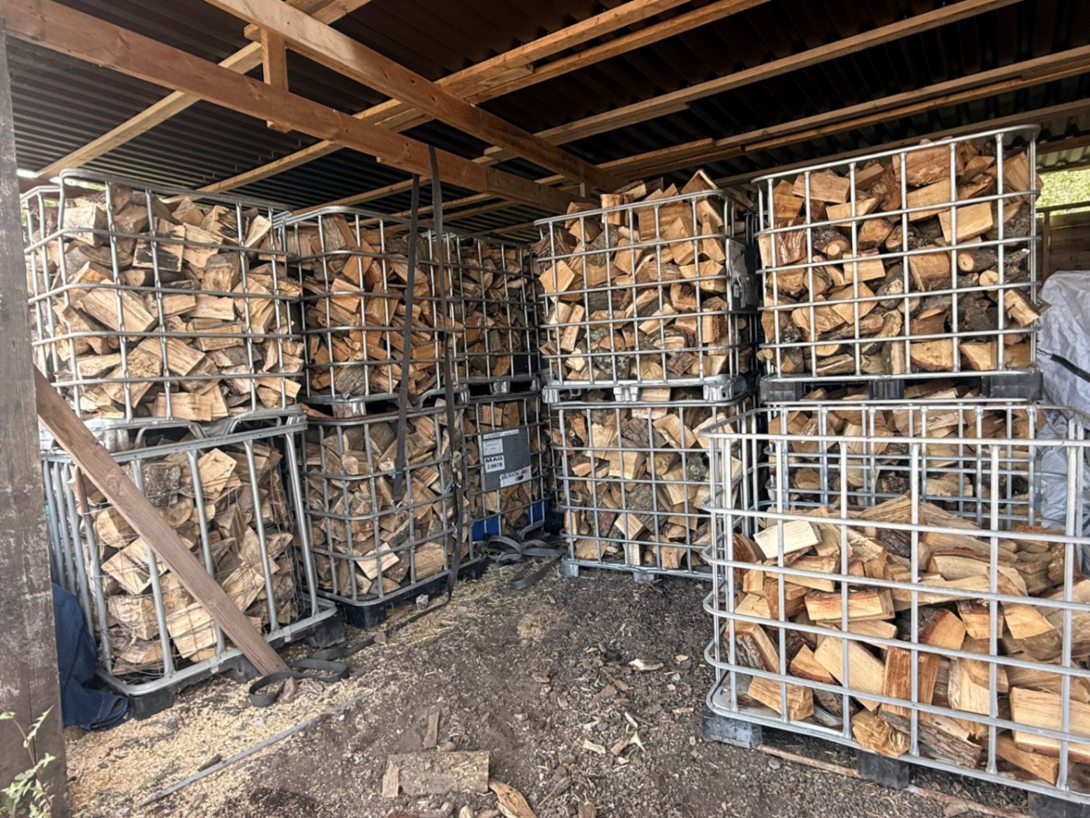 Rows of bulk firewood bags stored at the Little Acres Firewood yard